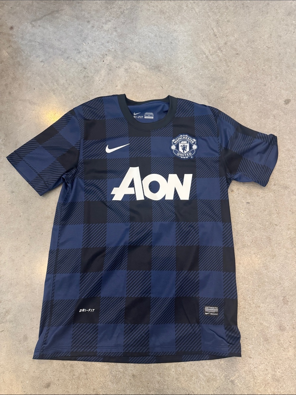 Nike Blue and Black Check Manchester United Training Shirt with AON Logo